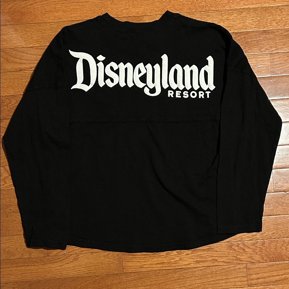This is a black and white Disneyland Resort Spirit Jersey.